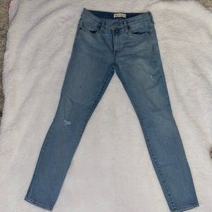 Size 27R skinny jeans with light distress